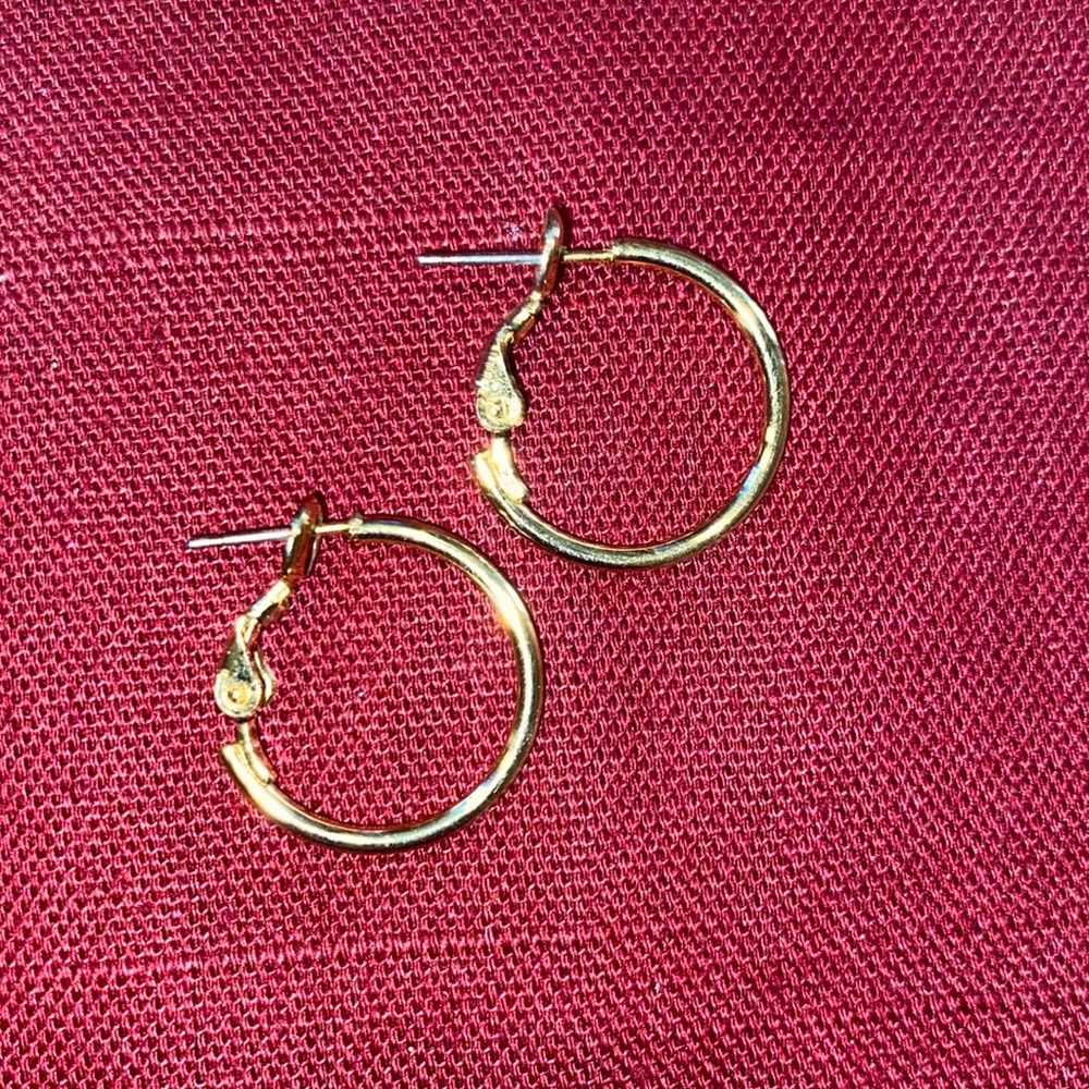 Gold color hoop earrings. Shiny!
